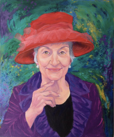 Portrait of a woman wearing red hat